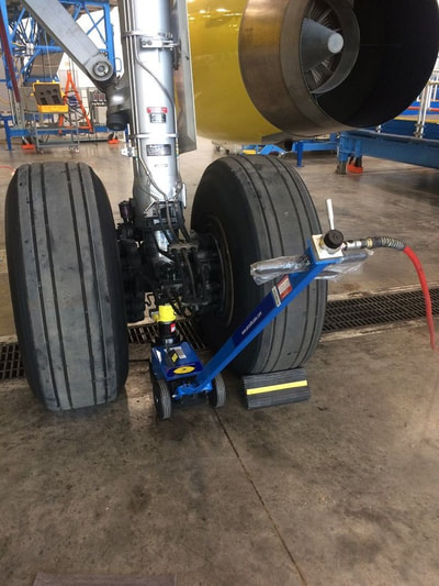 weighing a Boeing 767, weighing a Boeing 757, weighing a Boeing, Boeing weighing equipment, large jet weighing equipment, 767 weighing equipment, 767 weighing scales, 767 weighing procedure, A330 weighing equipment, A330 weighing, weighing an Airbus A330, Airbus A330 weighing system, weighing a Boeing 767 in less than 60 minutes, Boeing 757 weighing, weighing a Boeing 757, Weighing a Boeing jet, how to weigh a Boeing jet, how to weigh a Boeing 767,