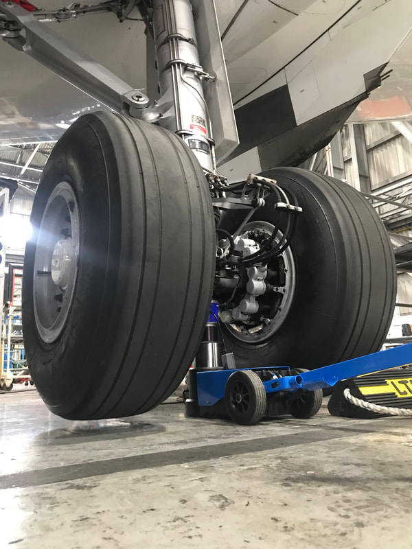 weighing a Boeing 767, weighing a Boeing 757, weighing a Boeing, Boeing weighing equipment, large jet weighing equipment, 767 weighing equipment, 767 weighing scales, 767 weighing procedure, A330 weighing equipment, A330 weighing, weighing an Airbus A330, Airbus A330 weighing system, weighing a Boeing 767 in less than 60 minutes, Boeing 757 weighing, weighing a Boeing 757, Weighing a Boeing jet, how to weigh a Boeing jet, how to weigh a Boeing 767,